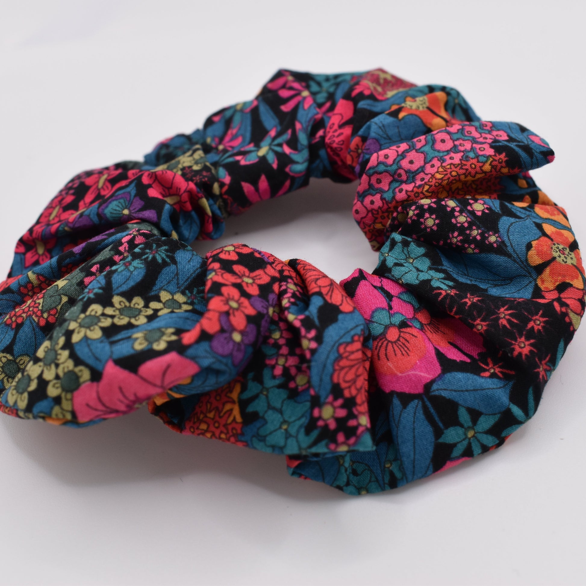 A girls hair scunchie in Ciara Hot Pink Liberty fabric. Made from Liberty of London Cotton by The Blossom Tree House. Ideal for Girls. Front view