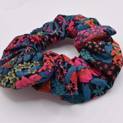 A girls hair scunchie in Ciara Hot Pink Liberty fabric. Made from Liberty of London Cotton by The Blossom Tree House. Ideal for Girls. Front view