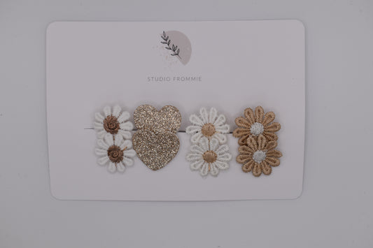 Hearts and daisies hair clip set for girls. White and gold colours. Top view. Made by Studio Frommie