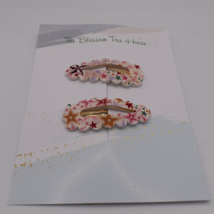 A barrette hair clip with a Liberty print design in Adelajda Red. Front-on view. Made by The Blossom Tree House