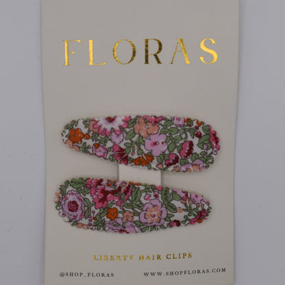 A pair of liberty print barrette clips in Amelie F pattern. Top view. Made by Floras