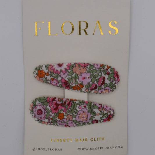 A pair of liberty print barrette clips in Amelie F pattern. Top view. Made by Floras