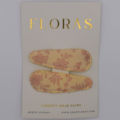 A pair of liberty print barrette clips in Capel Blossom pattern. Top view. Made by Floras