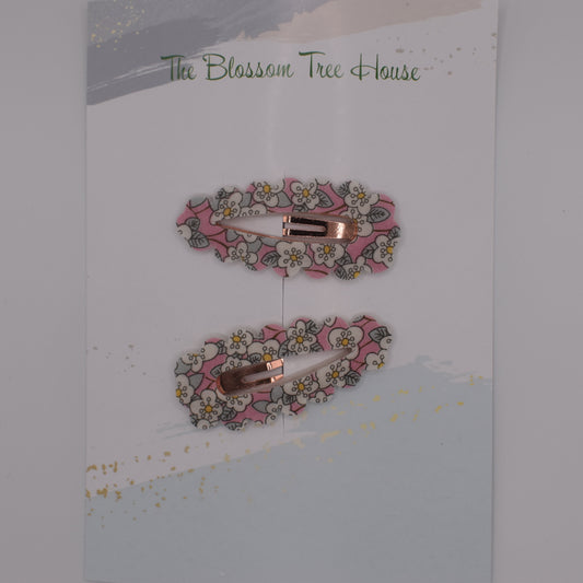 A barrette hair clip with a Liberty print design in Ffion. Top-down view. Made by The Blossom Tree House