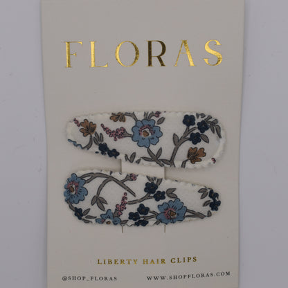 A pair of liberty print barrette clips in Hannah Fay C pattern. Top view. Made by Floras