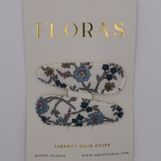 A pair of liberty print barrette clips in Hannah Fay C pattern. Top view. Made by Floras
