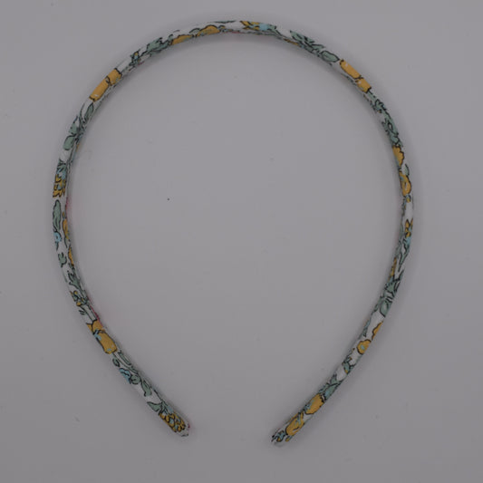 Meadow Yellow Liberty Print Headband. Made for Girls by The Blossom Tree House. Top down view