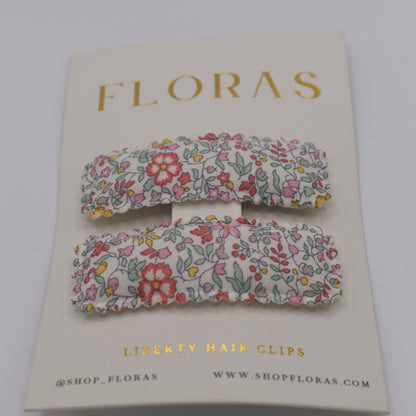 A pair of liberty print barrette clips in Katie and Millie B pattern. Another front view. Made by Floras