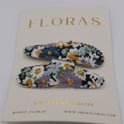 A pair of liberty print barrette clips in Libby B pattern. Front view. Made by Floras
