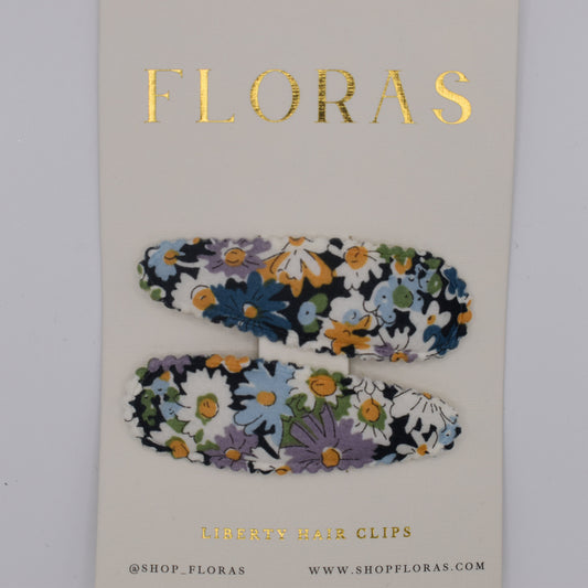 A pair of liberty print barrette clips in Libby B pattern. Top view. Made by Floras