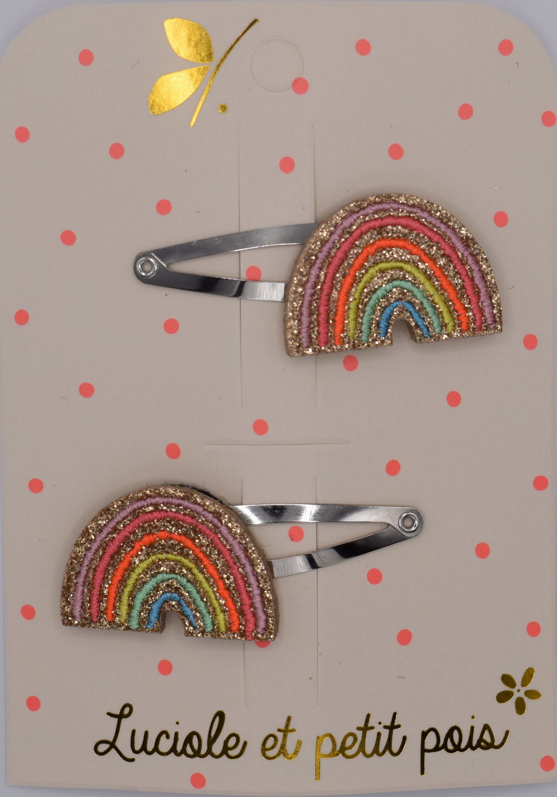 A pair of multicoloured rainbow hair clips for girls. Glittery. Top view. Made by Luciole et Petit Pois