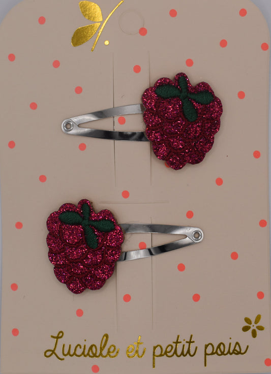 A pair of glitter raspberry hair clips for girls. Red colour. Top view. Made by Luciole et Petit Pois
