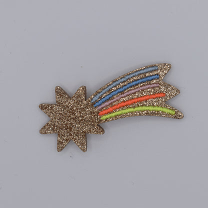 A glitter shooting star hair clip for girls. Multicoloured. Top view without backing card. Made by Luciole et Petit Pois