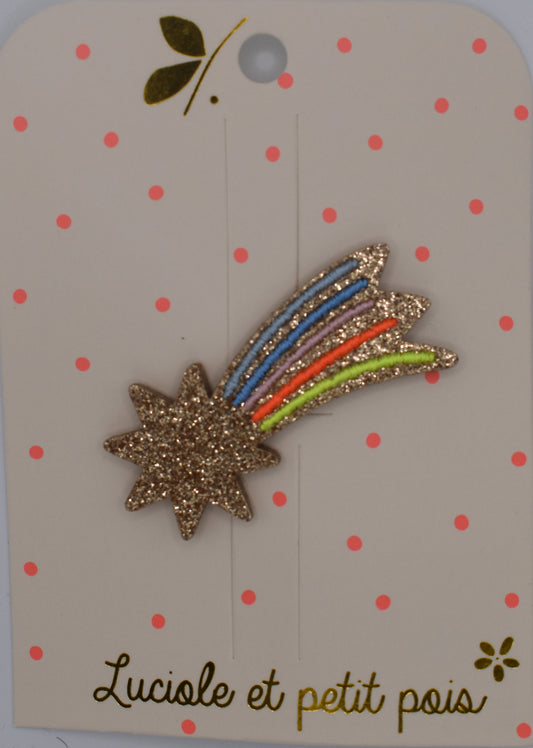 A glitter shooting star hair clip for girls. Multicoloured. Top view. Made by Luciole et Petit Pois