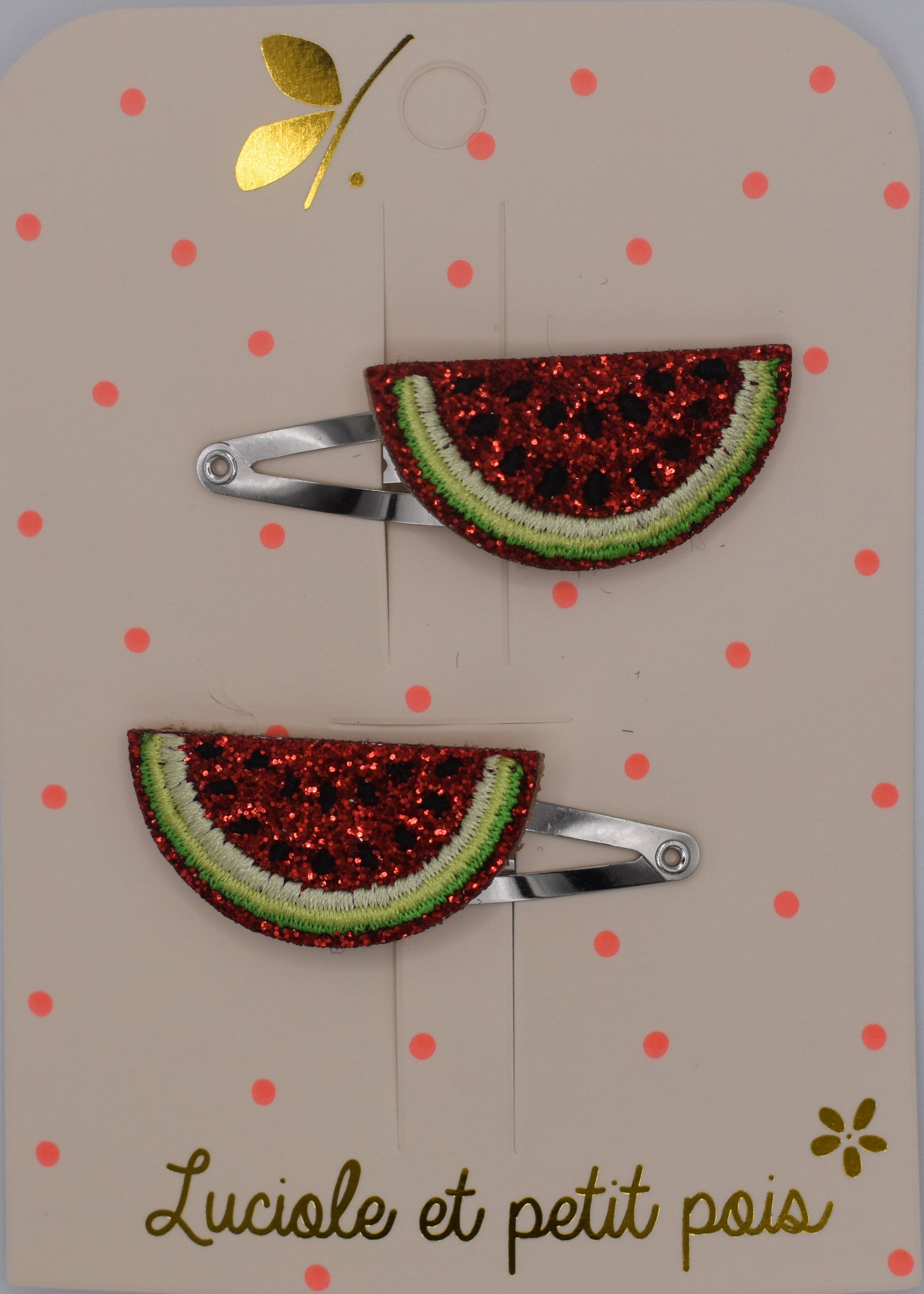 A pair of glitter watermelon hair clips for girls. Red and green colour. Top view. Made by Luciole et Petit Pois