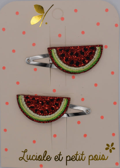 A pair of glitter watermelon hair clips for girls. Red and green colour. Top view. Made by Luciole et Petit Pois