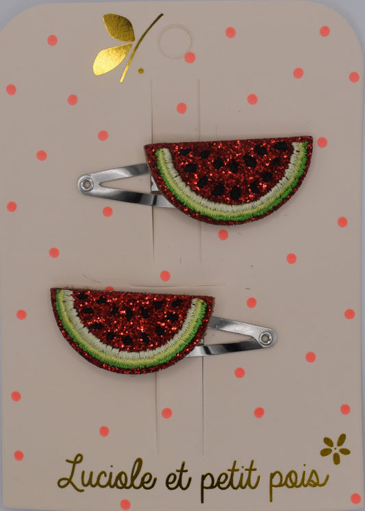 A pair of glitter watermelon hair clips for girls. Red and green colour. Top view. Made by Luciole et Petit Pois